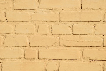 Close-up abstract yellow brick wall