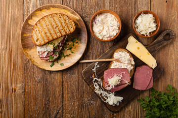 Ruben sandwich. New York sandwich with pastrami, sauce 1000 islands and sauerkraut.