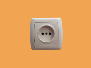 Electric socket isolated on a orange background