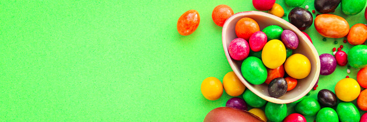 chocolate egg and candy easter decor, menu concept background. top view. copy space for text