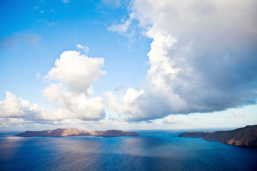 Fototapeta na wymiar clouds over the sea, Santorini Greece 