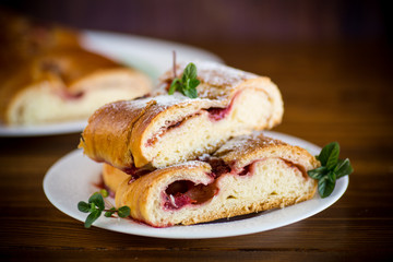 sweet baked yeast dough pie with berries