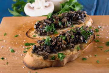 Sandwich with mushrooms and greens