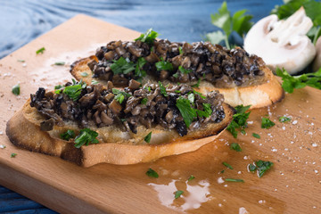 Sandwich with mushrooms and greens