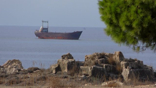 Wrecked ship. Hot summer air ranges from heat haze.