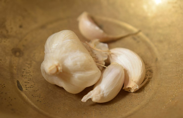 Fresh Garlic Cloves in Brass Bowl  Rustic Style
