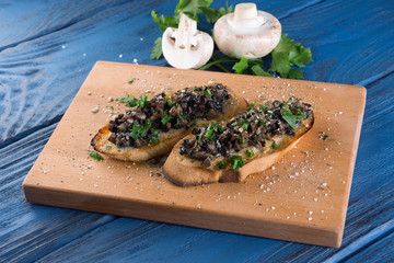 Sandwich with mushrooms and greens