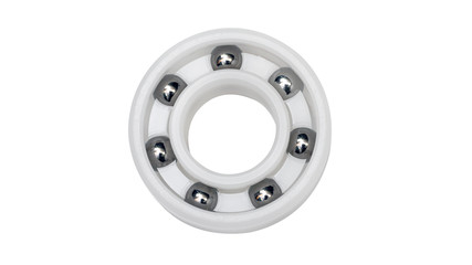 White plastic ball bearings solated on a white background.