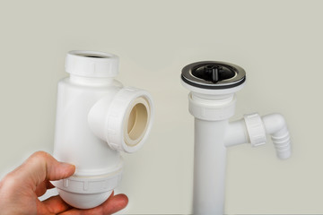 New kitchen sink bottle trap on a white background