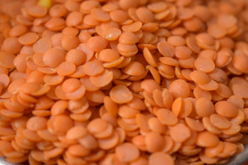 Dry Split Red Lentils as an abstract background texture