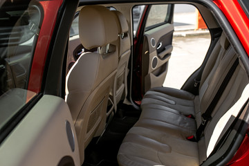 The interior of the car is beige leather | EKATERINBURG, RUSSIA - 28 AUGUST 2018.