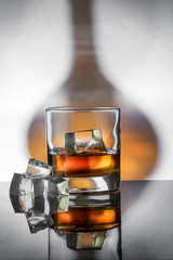 glass of whisky with ice