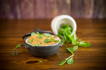 boiled bulgur groats with vegetables and herbs
