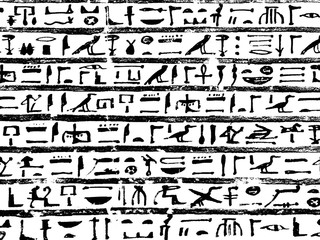 old egypt hieroglyphs carved on the stone