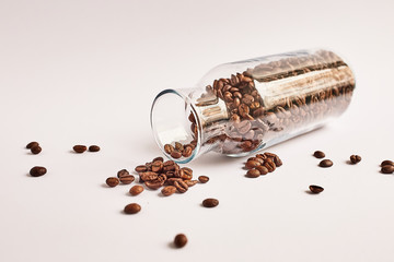 Roasted coffee beans in a glass jar