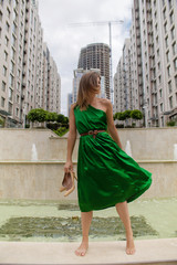 smiling girl walking in the city