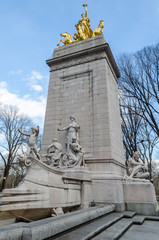 Fototapeta na wymiar A Random Golden Statue in a Park of New York City, USA