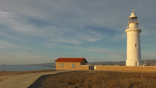 Mediterranean coast, Kato harbor near Paphos. Lighthouse and caretaker house.