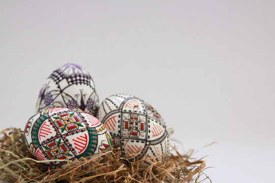 Traditional painted handmade Easter eggs on hay