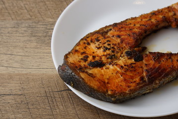 Grilled Salmon with garlic and herb by lemon