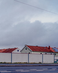 Houses with storm sky