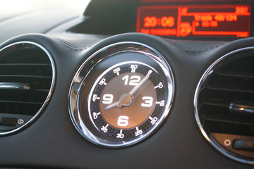 Clock in sports car dash