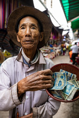 Old man is begging for money