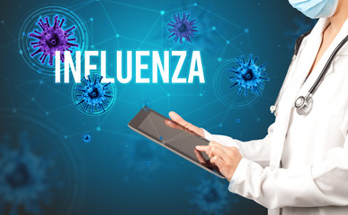 doctor prescribes a prescription with INFLUENZA inscription, pandemic concept