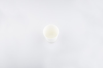 White cup in white