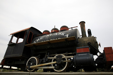 Naklejka premium Anchorage, Alaska / USA - August 08, 2019: An old locomotive in Anchorage, Anchorage, Alaska, USA