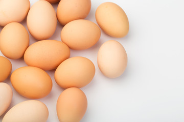 a lot of chicken eggs on a white background