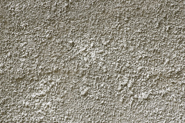 Grey unfinished wall texture. Rough wall surface background.