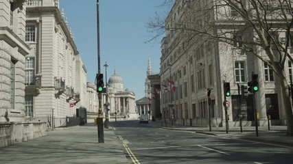 Lockdown London, Empty road towards Trafalgar Square during coronavirus pandemic, no people - Powered by Adobe