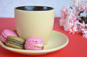 beige cup cappuccino beautiful white-pink aster flowers on a red background. good morning. greeting card. view from above. save space cookies macarune Mothers day or Womens day