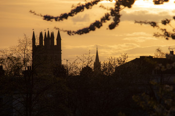 Oxford at sunset with clear skies and greenery