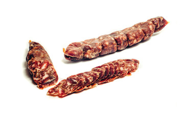 sliced jerky and sausage on a white background