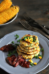 corn fritters  and Bacon. pancakes with corn. dish with corn.