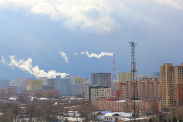 Pipes in city pollution of air with smoke ecology problem