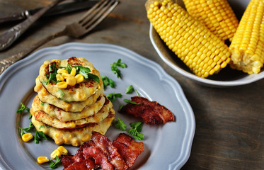corn fritters  and Bacon. pancakes with corn. dish with corn.