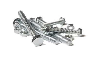 Lots of metal bolts and nuts. Tool for fixing. White background. Copy space
