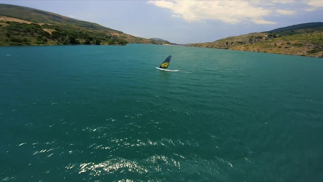 Lonely windsurf in a heavenly place, recorded with a FPV race drone