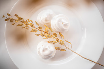 Homemade meringue on a white plate
