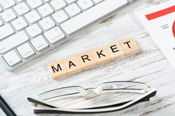 Fototapeta premium Market share concept with letters on cubes