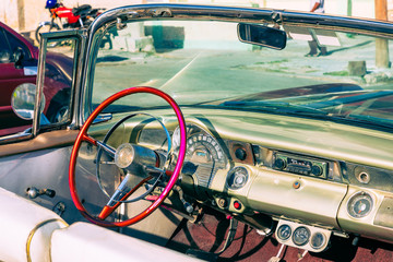 Havana Cuba Classic Cars. Typcal Havana urban scene with colorful buildings and old cars.