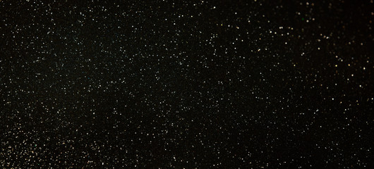 Blurred background with bokeh. Christmas and Happy New Year greeting card.