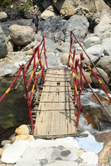 Footbridge over a mountain river