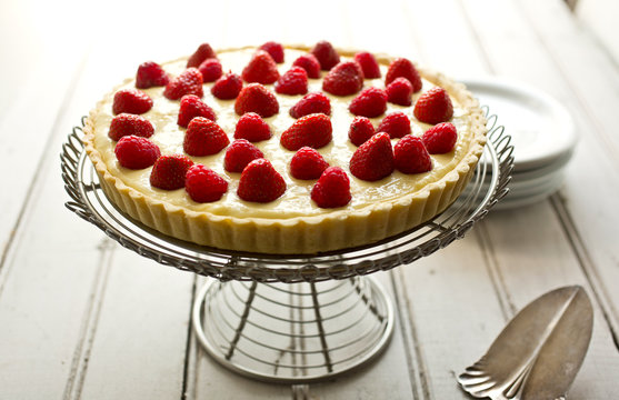 Raspberry tart on&dagger;cake stand