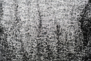 textured surface under water with waves. creativity