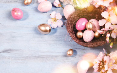 Easter background with Easter eggs and spring flowers