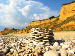 pebble castle on the beach, sand mountain